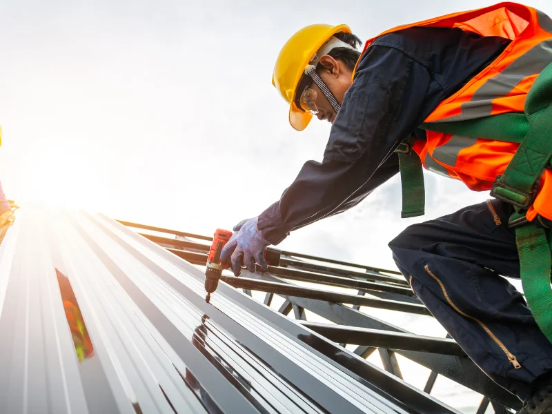 Image of professionals working on a roof.