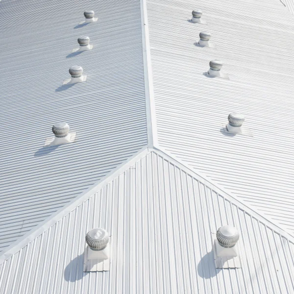 An image showing a commercial building with a newly installed roof in San Antonio.