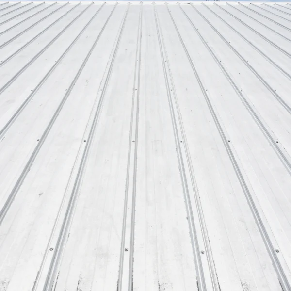 An image showing steel roofing panels with protective coatings.