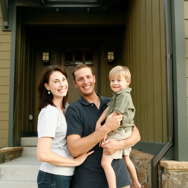 Image showing a homeowner after siding installation is completed in San Antonio.