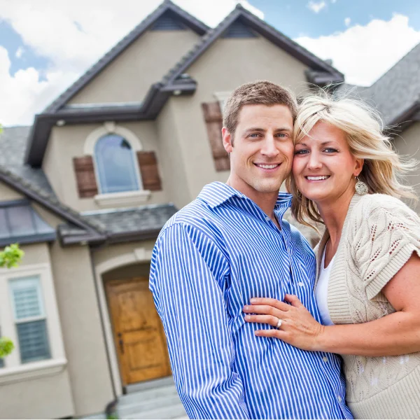 Image showing a satisfied homeowner after their roofing issues were solved in San Antonio, Texas.