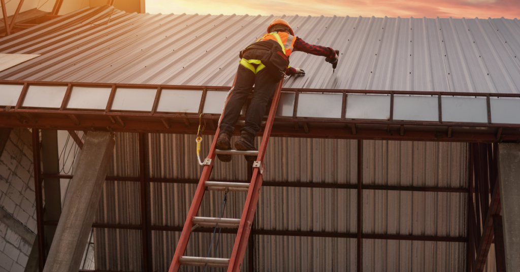 An image showing a professional repairing a metal roof in San Antonio, TX.